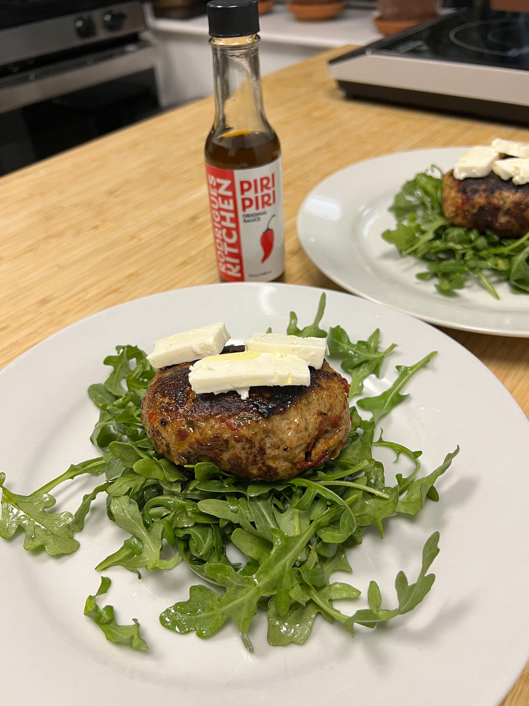 A juicy lamb burger made by Rodrigues Kitchen.